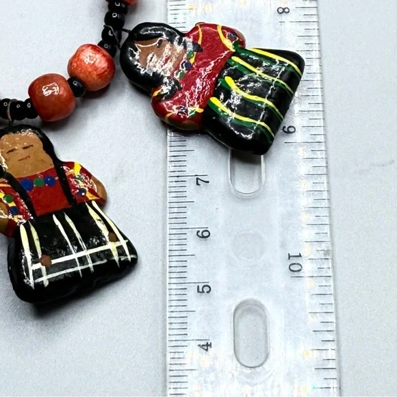 Vintage Colorful Guatemala Beaded Necklace featuring Clay Doll Charms